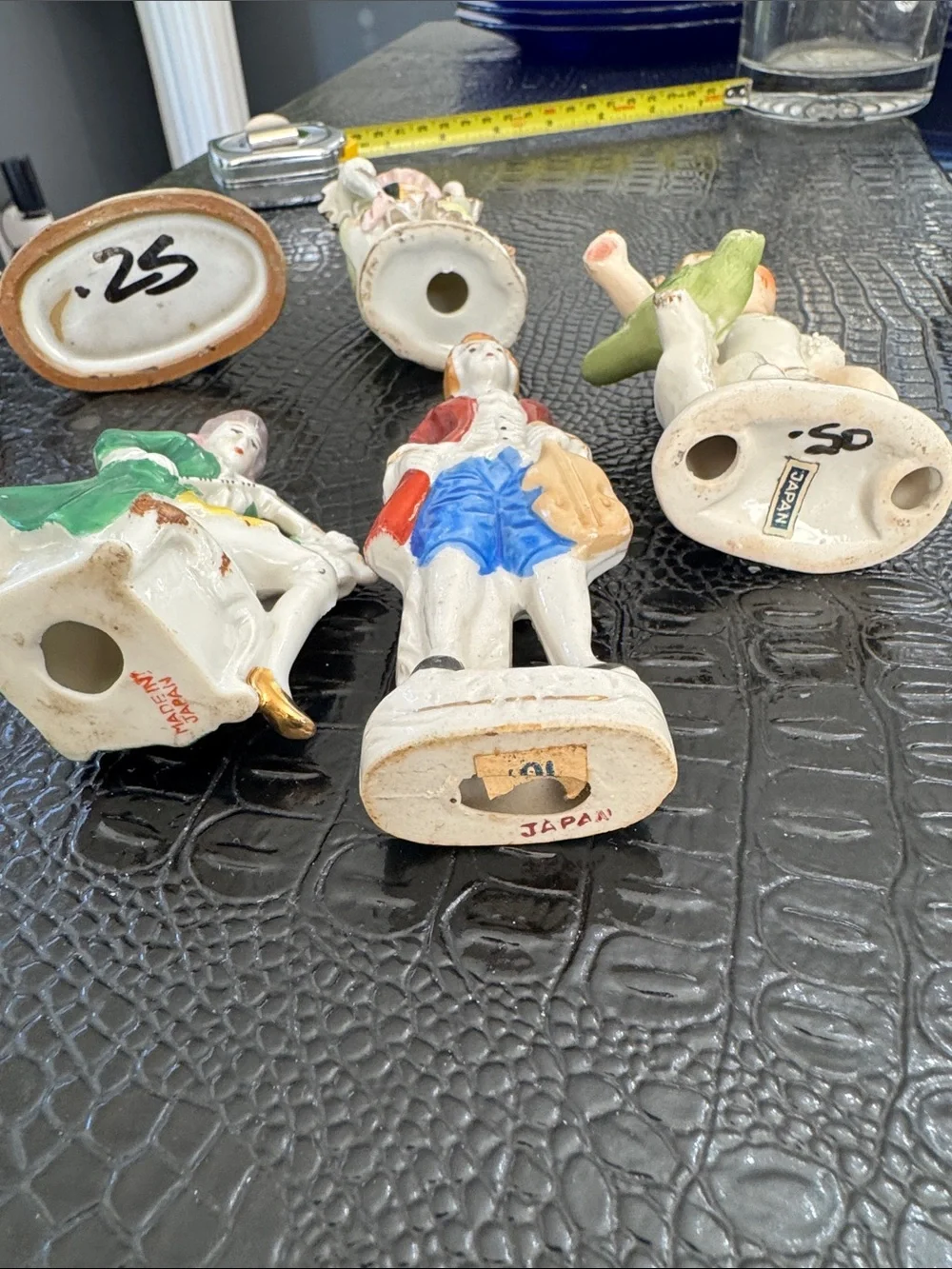 Source Unknown Porcelain Figurines in White, Red, Green, Blue, Tan